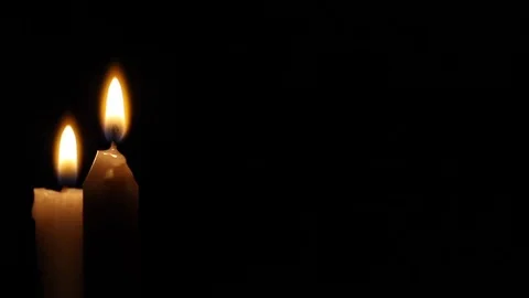 Light a candle with a match Stock Footage 83347734