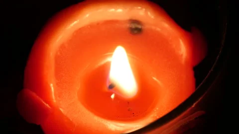 Light a candle by a match 库存影片 162602172