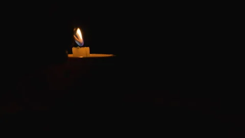 LIGHT CANDLE WITH MATCH STICK 4K C1712 Stock Footage 335652437