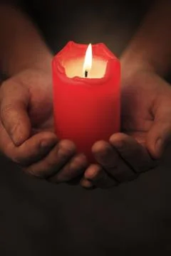 Light a candle Stock Photos