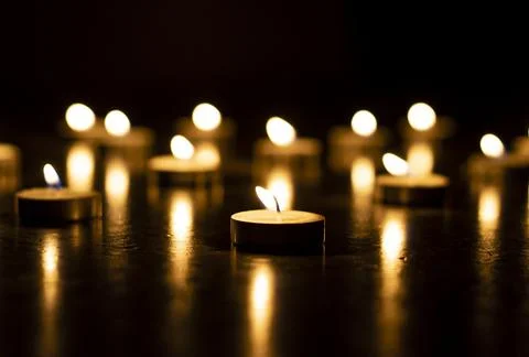 Light a candle Stock Photos