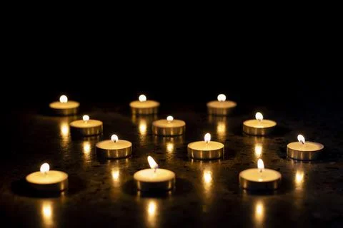 Light a candle Stock Photos