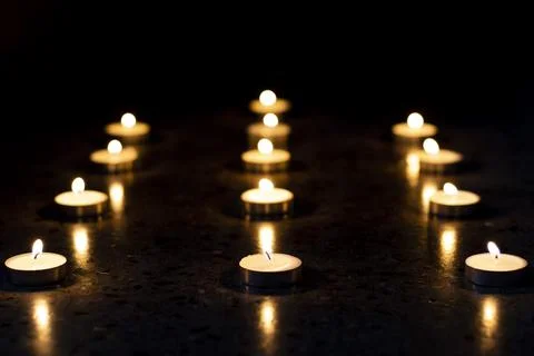 Light a candle Stock Photos