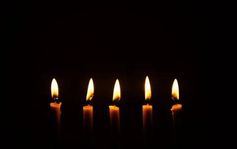 Light a candle to pray Stock Photos