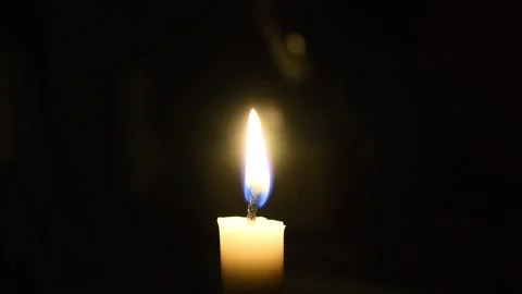 Light the candle by silver lighter in the dark, Close up footage Stock Footage 265697406
