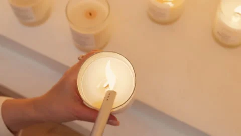 Light a candle on the table for a romantic setting. Media. Candle lights up from Stock-Footage 166203752