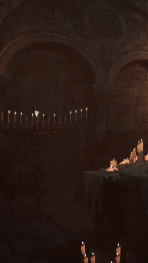 Light from candles in a dark ancient stone chamber at night in a castle Stock Footage 340275299