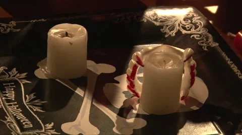 Light candles with a lighter, Halloween vampire dinner table Stock Footage 68019652
