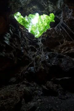 Light from the cave hole Stock Photos
