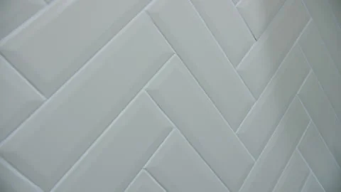 Light ceramic tiles at an angle in the bathroom Stock Footage 265614646