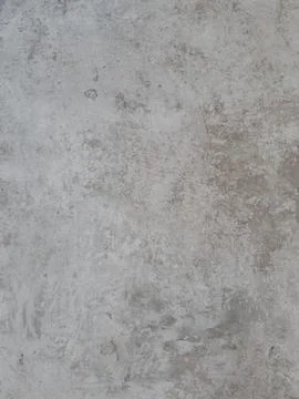 A light chalky grey surface with a slightly uneven texture provides a neutr.. Foto stock