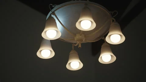 Light Chandelier Turns on and off Stock Footage 276378076