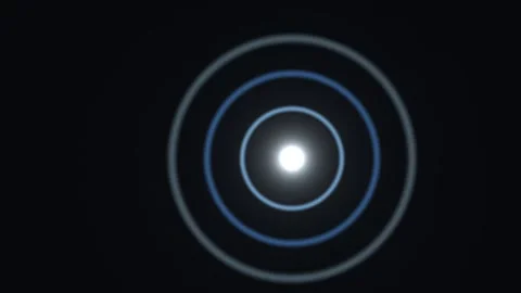 Light circles expanding in dark background Stock Footage 338995989