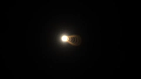 Light circles moving through dark space Stock Footage 338390500