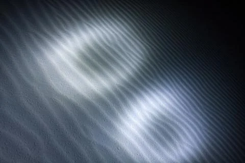 Light circles on the sand surface Foto stock