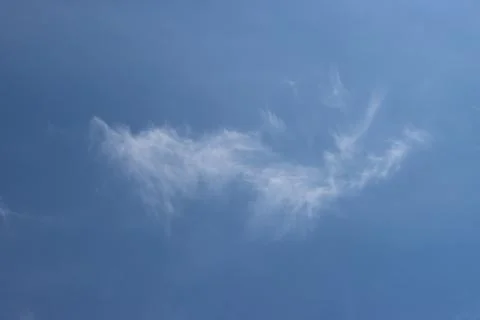 Light, cirrus clouds in the sky. Foto stock