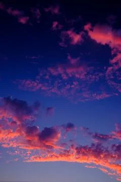Light cirrus clouds at sunset Stock Photos