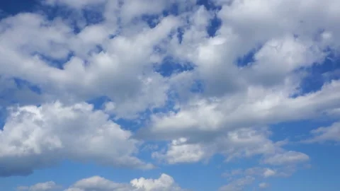 Light clouds are flying across the blue sky. Timelapse 스톡 동영상 336563811
