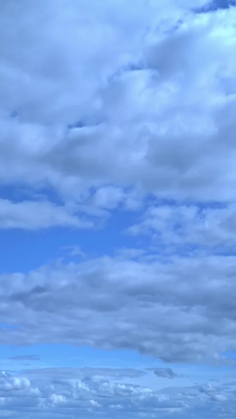 Light clouds are moving across the blue sky Video stock 346165773