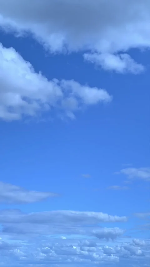 Light clouds are moving across the blue sky Video stock 346165779
