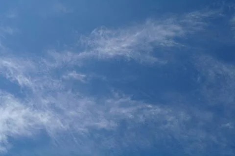 Light clouds in the blue sky Stock Photos