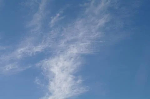 Light clouds in the blue sky Stock Photos