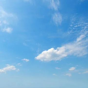 Light clouds in the blue sky Stock Photos