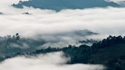 Light clouds cloud space in blue sky over the green horizon high mountains. Stock-Footage 336568790