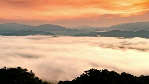 Light clouds cloud space in blue sky over the green horizon high mountains. Stock Footage 336568863
