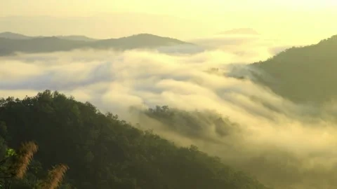 Light clouds cloud space in blue sky over the green horizon high mountains. 스톡 동영상 336568935