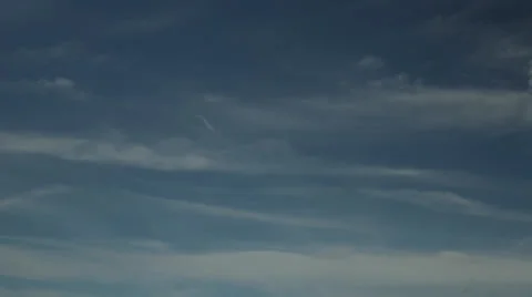 Light clouds drifting across a summer sky 4K Stock Footage 39932533