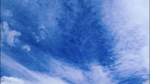 Light clouds floating on a blue autumn sky Stock Footage 95442094