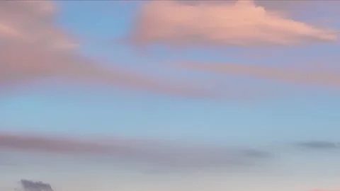 Light clouds at golden hour, sunset Stock Footage 168705067