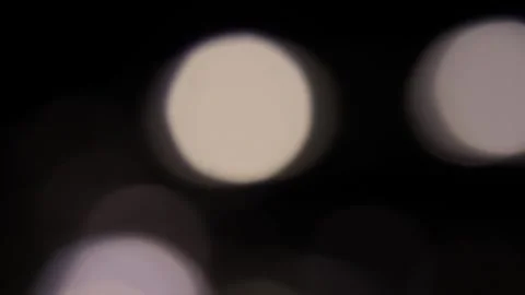 The light from the cluster lights slowly moves upwards. Vídeo Stock 317488856