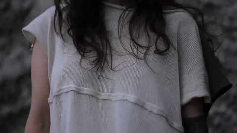 Light Colored Avant-Garde Top on an Unknown Brunette Girl Stock Footage 73597426