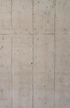 Light colored, concrete panels background. Vertical photo Stock Photos