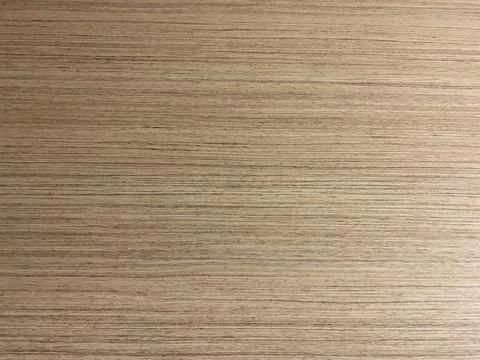 Light-colored laminate floor with a smooth finish, perfect for contemporary.. Foto stock