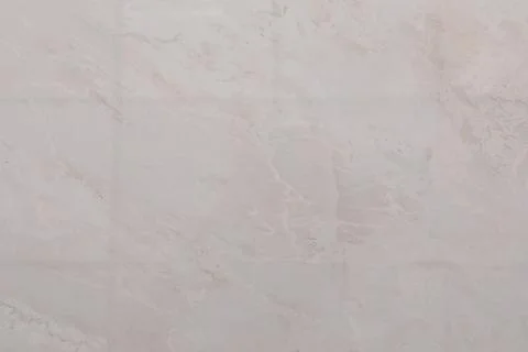 Light-colored marble surface with subtle patterns for design and decoration Foto stock