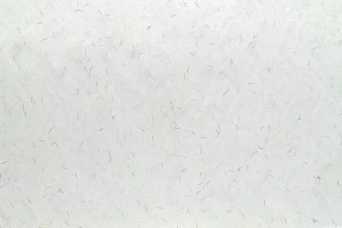 Light-colored paper with microfiber splashes and watermarks. Stock Photos