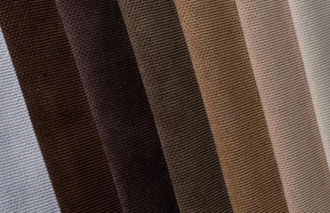 Light colors velour textile samples.. Fabric texture background Stock Photos