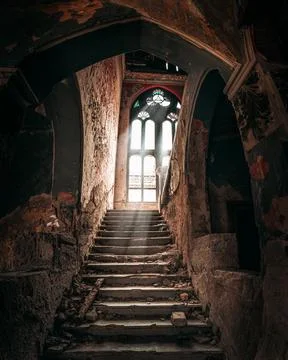 Light coming through a huge window in the haunted Spicer castle in Serbia Stock Photos