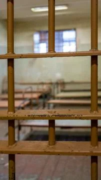 Light Coming in Through Prison Cell Bars Window. Empty Jail Cells. Prison Int 库存照片