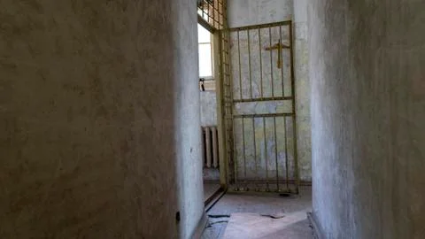 Light Coming in Through Prison Cell Bars Window. Empty Jail Cells. Prison Int Фото