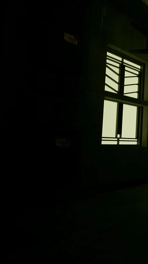 Light coming through a window in a dark room at night Stock Footage 339957754
