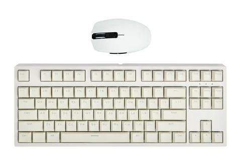 Light computer keyboard and mouse isolated on white background close-up, top Stock Photos