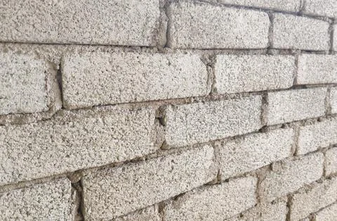 Light Concrete Brick Wall with Staggered Layout Stock Photos