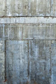 Light concrete wall background, traces of formwork and streaks Stockfoto's
