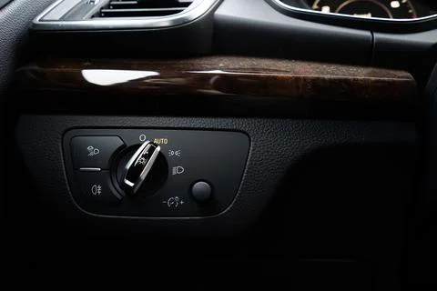 Light control panel in a modern car close-up. Stock Photos