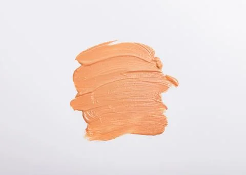Light cosmetics make-up foundation smudge isolated on white Stock Photos