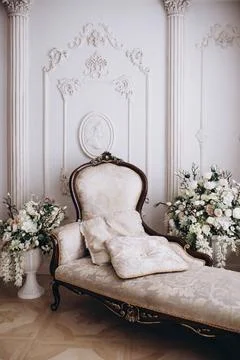 Light couch in a classic interior Stock Photos